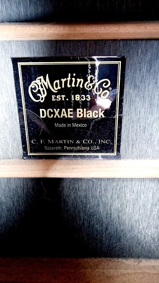 MARTIN DCXAE BLACK ELECTRO ACOUSTIC GUITAR